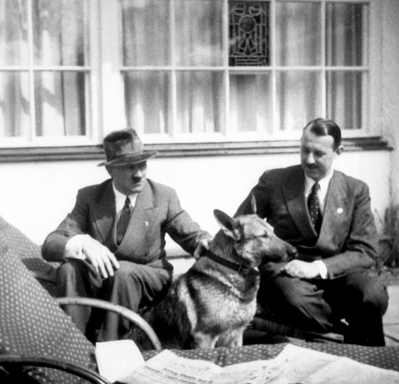 Adolf Hitler in conversation with Hermann Esser on the Berghof terrace, from Eva Braun's albums